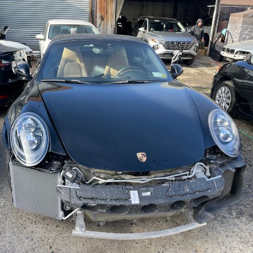 Damaged Porsche before collision repair at Frame Auto Collision in Nassau County NY